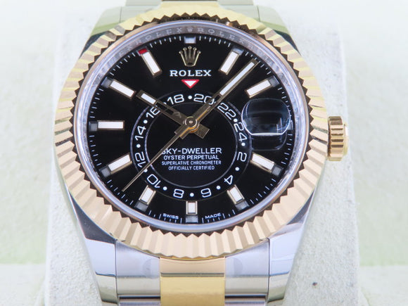 Rolex Sky Dweller Annual Calendar GMT 18 ct. Yellow Gold / Stainless Steel Black Dial 326933 New April 2023